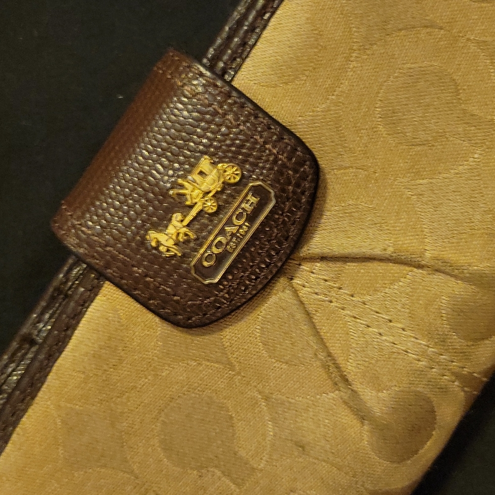 Brown and beige Coach wallet